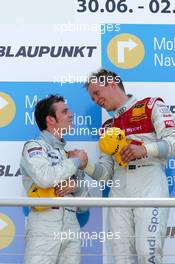 02.07.2006 Fawkham, England,  Podium, Mattias Ekström (SWE), Audi Sport Team Abt Sportsline, Portrait (1st, right), Jamie Green (GBR), AMG-Mercedes, Portrait (2nd, left) - DTM 2006 at Brands Hatch, England (Deutsche Tourenwagen Masters)