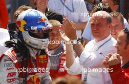 02.07.2006 Fawkham, England,  Mattias Ekström (SWE), Audi Sport Team Abt Sportsline, Audi A4 DTM is being congratulated by his team. In the white shirt Dr. Wolfgang Ullrich (GER), Audi's Head of Sport - DTM 2006 at Brands Hatch, England (Deutsche Tourenwagen Masters)