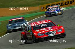 02.07.2006 Fawkham, England,  Bernd Schneider (GER), AMG-Mercedes, AMG-Mercedes C-Klasse, leads Mika Häkkinen (FIN), AMG-Mercedes, AMG-Mercedes C-Klasse and Martin Tomczyk (GER), Audi Sport Team Abt Sportsline, Audi A4 DTM - DTM 2006 at Brands Hatch, England (Deutsche Tourenwagen Masters)