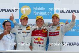 02.07.2006 Fawkham, England,  Podium, Mattias Ekström (SWE), Audi Sport Team Abt Sportsline, Portrait (1st, center), Jamie Green (GBR), AMG-Mercedes, Portrait (2nd, left) and Bernd Schneider (GER), AMG-Mercedes, Portrait (3rd, right). Far left: Hans-Jurgen Abt (GER), Teamchef Abt-Audi - DTM 2006 at Brands Hatch, England (Deutsche Tourenwagen Masters)