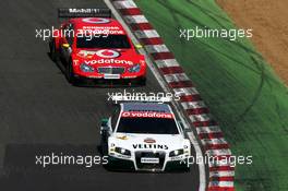 02.07.2006 Fawkham, England,  Heinz-Harald Frentzen (GER), Audi Sport Team Abt Sportsline, Audi A4 DTM, leads Bernd Schneider (GER), AMG-Mercedes, AMG-Mercedes C-Klasse - DTM 2006 at Brands Hatch, England (Deutsche Tourenwagen Masters)