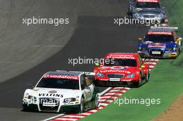 02.07.2006 Fawkham, England,  Heinz-Harald Frentzen (GER), Audi Sport Team Abt Sportsline, Audi A4 DTM, leads Bernd Schneider (GER), AMG-Mercedes, AMG-Mercedes C-Klasse, Martin Tomczyk (GER), Audi Sport Team Abt Sportsline, Audi A4 DTM and Mika Häkkinen (FIN), AMG-Mercedes, AMG-Mercedes C-Klasse - DTM 2006 at Brands Hatch, England (Deutsche Tourenwagen Masters)