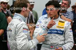 22.07.2006 Nurnberg, Germany,  Bruno Spengler (CDN), AMG-Mercedes, Portrait (right), talking with Jamie Green (GBR), AMG-Mercedes, Portrait (left) - DTM 2006 at Norisring (Deutsche Tourenwagen Masters)