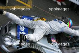 23.07.2006 Nurnberg, Germany,  Bruno Spengler (CDN), AMG-Mercedes, lying on top of his car after winning the race - DTM 2006 at Norisring (Deutsche Tourenwagen Masters)