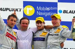23.07.2006 Nurnberg, Germany,  Podium, Bruno Spengler (CDN), AMG-Mercedes, Portrait (1st, center), Bernd Schneider (GER), AMG-Mercedes, Portrait (2nd, left) and Mika Häkkinen (FIN), AMG-Mercedes, Portrait (3rd, right) - DTM 2006 at Norisring (Deutsche Tourenwagen Masters)