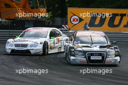 23.07.2006 Nurnberg, Germany,  Christian Abt (GER), Audi Sport Team Phoenix, Audi A4 DTM, holding up Jamie Green (GBR), AMG-Mercedes, AMG-Mercedes C-Klasse - DTM 2006 at Norisring (Deutsche Tourenwagen Masters)