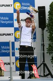 23.07.2006 Nurnberg, Germany,  Podium, Gerhard Ungar (GER), Chief Designer AMG. with the trophy for the winning constructor - DTM 2006 at Norisring (Deutsche Tourenwagen Masters)