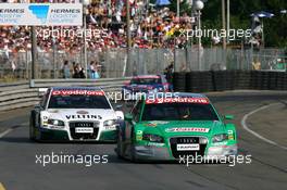 23.07.2006 Nurnberg, Germany,  Pierre Kaffer (GER), Audi Sport Team Phoenix, Audi A4 DTM, leads Heinz-Harald Frentzen (GER), Audi Sport Team Abt Sportsline, Audi A4 DTM - DTM 2006 at Norisring (Deutsche Tourenwagen Masters)