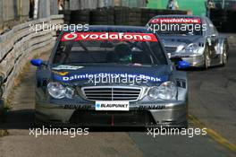 23.07.2006 Nurnberg, Germany,  Bruno Spengler (CDN), AMG-Mercedes, AMG-Mercedes C-Klasse, leads Mika Häkkinen (FIN), AMG-Mercedes, AMG-Mercedes C-Klasse - DTM 2006 at Norisring (Deutsche Tourenwagen Masters)