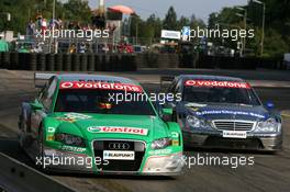 23.07.2006 Nurnberg, Germany,  Race winner Bruno Spengler (CDN), AMG-Mercedes, AMG-Mercedes C-Klasse, struggling with back markers - DTM 2006 at Norisring (Deutsche Tourenwagen Masters)