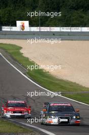 19.08.2006 Nürburg, Germany,  Bernd Schneider (GER), AMG-Mercedes, AMG-Mercedes C-Klasse and Vanina Ickx (BEL), Team Midland, Audi A4 DTM - DTM 2006 at Nürburgring (Deutsche Tourenwagen Masters)