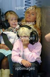 02.09.2006 Zandvoort, The Netherlands,  The wife and the children of Tom Kristensen (DNK), Audi Sport Team Abt Sportsline, Audi A4 DTM watching the performances of their father and husband from the garage. - DTM 2006 at Zandvoort, The Netherlands (Deutsche Tourenwagen Masters)