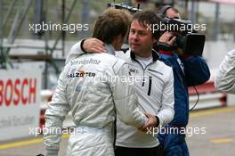 02.09.2006 Zandvoort, The Netherlands,  Gerhard Ungar (GER), Chief Designer AMG, congratulates Jamie Green (GBR), AMG-Mercedes, Portrait, with his pole position - DTM 2006 at Zandvoort, The Netherlands (Deutsche Tourenwagen Masters)