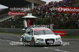 03.09.2006 Zandvoort, The Netherlands,  Race winner Tom Kristensen (DNK), Audi Sport Team Abt Sportsline, Audi A4 DTM, coming out of the pits with a refuelling can - DTM 2006 at Zandvoort, The Netherlands (Deutsche Tourenwagen Masters)