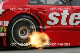 13.10.2006 Le Mans, France,  Flames out of the exhaust of the car of Jean Alesi (FRA), Persson Motorsport AMG-Mercedes, AMG-Mercedes C-Klasse - DTM 2006 at Le Mans Bugatti Circuit, France (Deutsche Tourenwagen Masters)