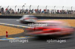 14.10.2006 Le Mans, France,  Art impression of the DTM cars going through the first chicane. With the shutterspeed of the camera deliberately slow it cause a blurry image. - DTM 2006 at Le Mans Bugatti Circuit, France (Deutsche Tourenwagen Masters)
