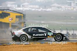 14.10.2006 Le Mans, France,  Christian Abt (GER), Audi Sport Team Phoenix, Audi A4 DTM, returning on the track after a spin into the gravel, throwing a lot of stones on the track - DTM 2006 at Le Mans Bugatti Circuit, France (Deutsche Tourenwagen Masters)