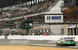 14.10.2006 Le Mans, France,  General view of the Le Mans grandstand with Pierre Kaffer (GER), Audi Sport Team Phoenix, Audi A4 DTM driving by. - DTM 2006 at Le Mans Bugatti Circuit, France (Deutsche Tourenwagen Masters)