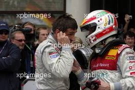 15.10.2006 Le Mans, France,  Tom Kristensen (DNK), Audi Sport Team Abt Sportsline, Portrait (3rd, right), congratulates Bernd Schneider (GER), AMG-Mercedes, Portrait, with the 2006 DTM championship - DTM 2006 at Le Mans Bugatti Circuit, France (Deutsche Tourenwagen Masters)