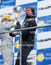 15.10.2006 Le Mans, France,  Gerhard Ungar (GER), Chief Designer AMG being showered by champagne from his drivers on the podium. - DTM 2006 at Le Mans Bugatti Circuit, France (Deutsche Tourenwagen Masters)