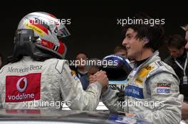15.10.2006 Le Mans, France,  New 2006 DTM champion Bernd Schneider (GER), AMG-Mercedes, Portrait (left) and race winner Bruno Spengler (CDN), AMG-Mercedes, Portrait (right) - DTM 2006 at Le Mans Bugatti Circuit, France (Deutsche Tourenwagen Masters)