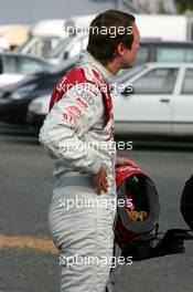 15.10.2006 Le Mans, France,  Frank Stippler (GER), Audi Sport Team Rosberg, Portrait, watches a replay of his accident on a big screen - DTM 2006 at Le Mans Bugatti Circuit, France (Deutsche Tourenwagen Masters)
