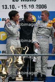 15.10.2006 Le Mans, France,  Podium, Gerhard Ungar (GER), Chief Designer AMG (center), Bruno Spengler (CDN), AMG-Mercedes, Portrait (1st, left) and Mika Häkkinen (FIN), AMG-Mercedes, Portrait (2nd, right) - DTM 2006 at Le Mans Bugatti Circuit, France (Deutsche Tourenwagen Masters)