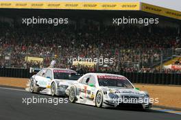 15.10.2006 Le Mans, France,  Jamie Green (GBR), AMG-Mercedes, AMG-Mercedes C-Klasse, leads Tom Kristensen (DNK), Audi Sport Team Abt Sportsline, Audi A4 DTM - DTM 2006 at Le Mans Bugatti Circuit, France (Deutsche Tourenwagen Masters)