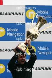 15.10.2006 Le Mans, France,  Podium, Gerhard Ungar (GER), Chief Designer AMG, with the trophy for the winning constructor - DTM 2006 at Le Mans Bugatti Circuit, France (Deutsche Tourenwagen Masters)
