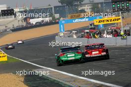 15.10.2006 Le Mans, France,  Bernd Schneider (GER), AMG-Mercedes, AMG-Mercedes C-Klasse made a bold overtaking manoeuvre on Pierre Kaffer (GER), Audi Sport Team Phoenix, Audi A4 DTM when entering the last corner before the straight. They touched eachother and wheelbanged on for a while whilst the crowd got excited. - DTM 2006 at Le Mans Bugatti Circuit, France (Deutsche Tourenwagen Masters)