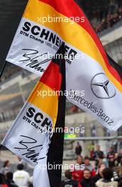 15.10.2006 Le Mans, France,  Special flags to celebrate Schneider's 5th championship win. - DTM 2006 at Le Mans Bugatti Circuit, France (Deutsche Tourenwagen Masters)