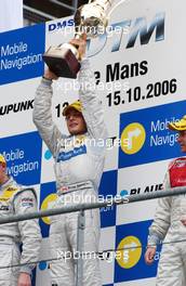 15.10.2006 Le Mans, France,  Bruno Spengler (CDN), AMG-Mercedes, AMG-Mercedes C-Klasse with his trophy for victory. - DTM 2006 at Le Mans Bugatti Circuit, France (Deutsche Tourenwagen Masters)