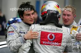 15.10.2006 Le Mans, France,  Race winner Bruno Spengler (CDN), AMG-Mercedes, Portrait (1st, left) and Mika Häkkinen (FIN), AMG-Mercedes, Portrait (2nd, right), congratulate the new 2006 DTM champion Bernd Schneider (GER), AMG-Mercedes - DTM 2006 at Le Mans Bugatti Circuit, France (Deutsche Tourenwagen Masters)