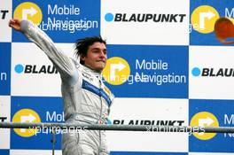 15.10.2006 Le Mans, France,  Podium, Bruno Spengler (CDN), AMG-Mercedes, Portrait (1st), throws his hat away - DTM 2006 at Le Mans Bugatti Circuit, France (Deutsche Tourenwagen Masters)