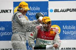 15.10.2006 Le Mans, France,  Podium, Bruno Spengler (CDN), AMG-Mercedes, Portrait (1st, left) and Tom Kristensen (DNK), Audi Sport Team Abt Sportsline, Portrait (3rd, right) - DTM 2006 at Le Mans Bugatti Circuit, France (Deutsche Tourenwagen Masters)