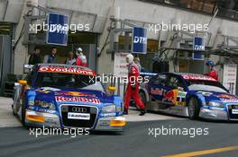 15.10.2006 Le Mans, France,  Martin Tomczyk (GER), Audi Sport Team Abt Sportsline, Audi A4 DTM and Mattias Ekström (SWE), Audi Sport Team Abt Sportsline, Audi A4 DTM, driving out of the pitbox - DTM 2006 at Le Mans Bugatti Circuit, France (Deutsche Tourenwagen Masters)