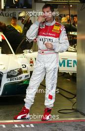 27.10.2006 Hockenheim, Germany,  Heinz-Harald Frentzen (GER), Audi Sport Team Abt Sportsline, Portrait. Putting in his earplugs before the practice session. - DTM 2006 at Hockenheimring (Deutsche Tourenwagen Masters)