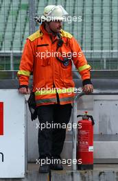 27.10.2006 Hockenheim, Germany,  Local fireguard in the pitlane. - DTM 2006 at Hockenheimring (Deutsche Tourenwagen Masters)