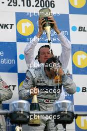 29.10.2006 Hockenheim, Germany,  Hans-Jürgen Mattheis (GER), Team Manager HWA, gives Bruno Spengler (CDN), AMG-Mercedes, Portrait (1st) a champaign shower - DTM 2006 at Hockenheimring (Deutsche Tourenwagen Masters)