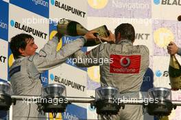 29.10.2006 Hockenheim, Germany,  Top 2 finishers of the 2006 DTM championship: Bernd Schneider (GER), AMG-Mercedes, Portrait (1st, center) and Bruno Spengler (CDN), AMG-Mercedes, Portrait (2nd, left) - DTM 2006 at Hockenheimring (Deutsche Tourenwagen Masters)