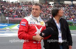 29.10.2006 Hockenheim, Germany,  Jean Alesi (FRA), Persson Motorsport AMG-Mercedes, AMG-Mercedes C-Klasse drove his very last DTM race at Hockenheim. Some emotional and farewell sayings at the startinggrid. Here is is with Mario Miyakawa (JPN), manager of Jean Alesi (FRA), AMG-Mercedes, Mercedes-Benz CLK-DTM at the startinggrid. - DTM 2006 at Hockenheimring (Deutsche Tourenwagen Masters)