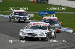 29.10.2006 Hockenheim, Germany,  Mika Häkkinen (FIN), AMG-Mercedes, AMG-Mercedes C-Klasse, leads Timo Scheider (GER), Audi Sport Team Rosberg, Audi A4 DTM and Christian Abt (GER), Audi Sport Team Phoenix, Audi A4 DTM - DTM 2006 at Hockenheimring (Deutsche Tourenwagen Masters)