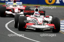31.03.2006 Melbourne, Australia,  Takuma Sato (JPN), Super Aguri F1 leads Ralf Schumacher (GER), Toyota Racing - Formula 1 World Championship, Rd 3, Australian Grand Prix, Friday Practice