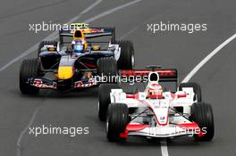 31.03.2006 Melbourne, Australia,  Yuji Ide (JPN), Super Aguri F1 leads Robert Doornbos (NED), Test Driver, Red Bull Racing - Formula 1 World Championship, Rd 3, Australian Grand Prix, Friday Practice