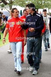 31.03.2006 Melbourne, Australia,  Michael Schumacher (GER), Scuderia Ferrari, Mark Webber (AUS), Williams F1 Team - Formula 1 World Championship, Rd 3, Australian Grand Prix, Friday