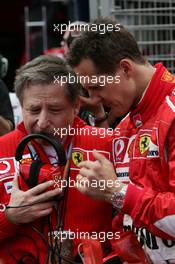 02.04.2006 Melbourne, Australia,  Jean Todt (FRA), Scuderia Ferrari, Teamchief, General Manager, Team Principal and Michael Schumacher (GER), Scuderia Ferrari - Formula 1 World Championship, Rd 3, Australian Grand Prix, Sunday Pre-Race Grid