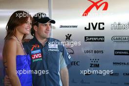 30.03.2006 Melbourne, Australia,  Markus Winkelhock (GER), Test Driver, Midland MF1 Racing  with the face of Fosters Kasia - Formula 1 World Championship, Rd 3, Australian Grand Prix, Thursday