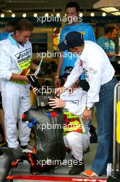 30.03.2006 Melbourne, Australia,  The FIA check the Renault F1 Team seats - Formula 1 World Championship, Rd 3, Australian Grand Prix, Thursday