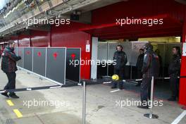 27.01.2006 Barcelona, Spain,  McLaren Mercedes mechanics play football in the pitlane whist waiting for the weather to improve - Formula One Testing, Circuit de Catalunya