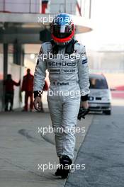 23.01.2006 Barcelona, Spain,  Gary Paffet (GBR), Test Driver, walks back after stopping in an interim Orange McLaren Mercedes - Formula One Testing, Circuit de Catalunya